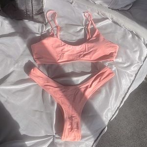 Light coral 2 piece bathing suit. Very cheeky. Sz M worn once great condition